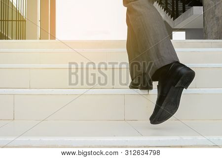 Business Man Step Up Stair.lower Part Of Man In Business Shoes Walking Up Stair,people Lifestyle Suc