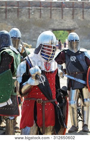 Odessa, Ukraine - July 20, 2019: Battle Of The Knights With Medieval Weapons At The Medieval Perform