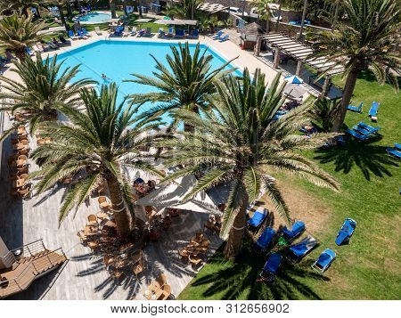 Malia. Crete, Greece - Juni 18, 2019: Swimming Pool At Luxury Hotel In Malia On Crete, Greece