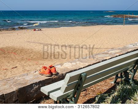 Malia, Crete, Greece - Juni 18, 2019:  View Of Sandy Beach In Malia On Crete, Greece