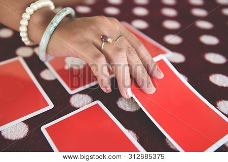 Tarot Cards Reading Divination / Psychic Readings And Clairvoyance Fortune Teller Hands Concept