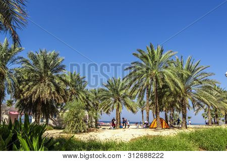 Dubai, Uae - November 30, 2018: Rest On The City Beach. Al Mamzar Beach Park.