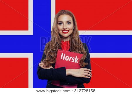 Norway. Cheerful Pretty Woman Student Against The Norway Flag Background. Travel And Learn Norwegian