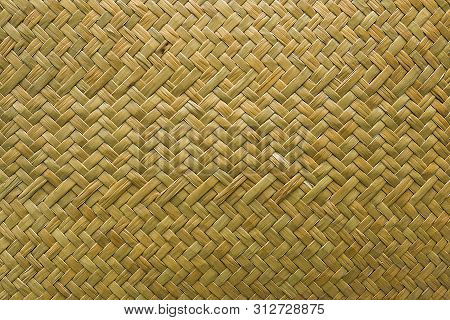 Natural Wicker Braided Woven Rattan Sedge Grass Texture Background