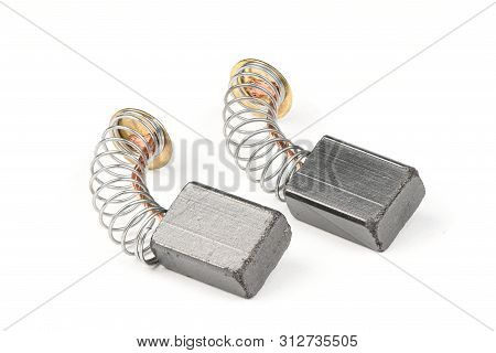 Electro-conductive Graphite Brushes Electric Current To The Electro Fret On A White Background