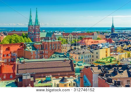 Aerial Panorama Of Helsinki. Cityscape Of The Capital Of Finland With Baltic Sea In The Background. 
