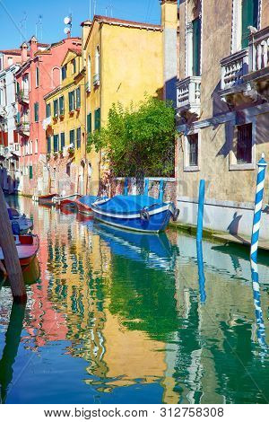 Canals Of Venice With Reflection In Water, Italy