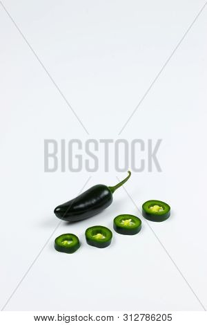 Fresh Jalapeno Maxican Chilli Pepper In Isolated Background