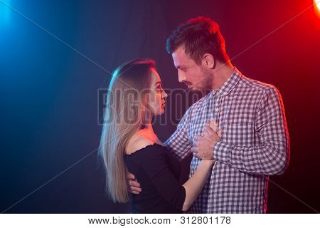 Social Dance, Kizomba, Salsa And Semba Concept - Young Beautiful Couple Dancing Bachata Or Salsa In 