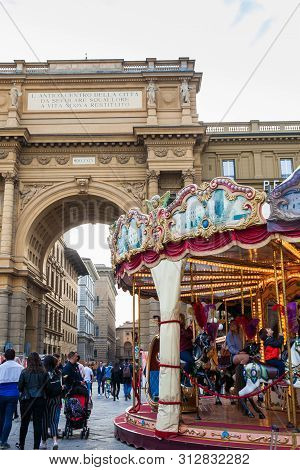 Florence, Italy - April, 2018: Tourists And Locals At The Republic Square Next To The Carrousel And