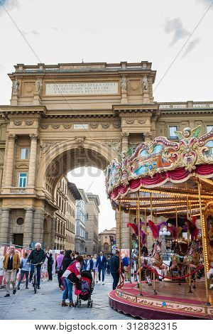 Florence, Italy - April, 2018: Tourists And Locals At The Republic Square Next To The Carrousel And