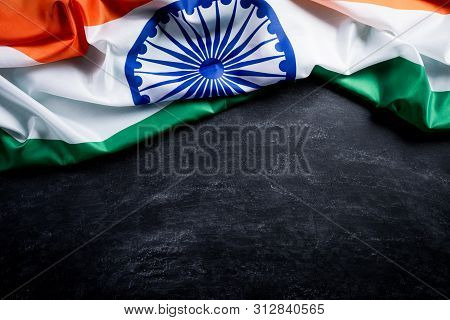 Top View Of National Flag Of India On Blackboard Background. Indian Independence Day.