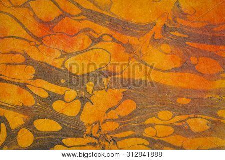 background of textured handmade Thai marbled momi mulberry paper with backlight