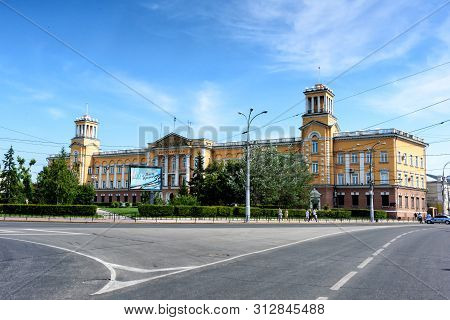 Russia, Irkutsk - July 6, 2019: Building Vostsibugol Trade And Industry Company. Tikhvinsky Or Kirov