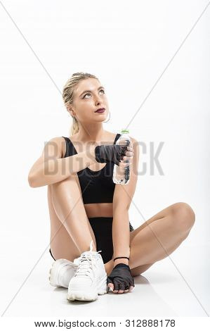 Woman After Sport Drinking Water From Bottle