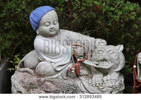 Miyajima, Japan - April 21, 2012: Jizo Statue At Daishouin Buddhist Temple Of Itsukushima Island In 