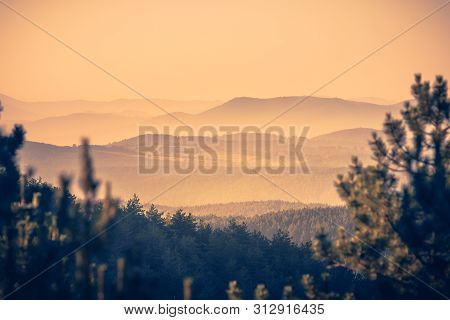 Sunrise In Mountain Landscape. Mountain In Sunrise. Sunrise In Mountain Forest Landscape. Forest And