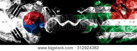 South Korea Vs Abkhazia, Abkhazian Smoky Mystic Flags Placed Side By Side. Thick Colored Silky Abstr