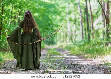 Elf Archer From Behind In The Woods