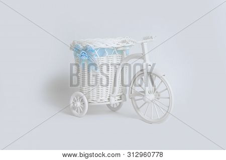 Toy Bike With Basket On White Background. The Concept Of Props.