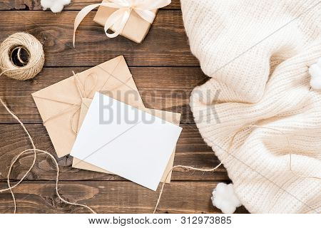 Autumn Or Winter Composition. Women Fashion Sweater, Gift Box, Craft Paper Envelope And White Card M