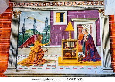 San Gimignano, Italy - September 26, 2017 Annunciation Angel Medieval Renaissance Fresco Baptistery 