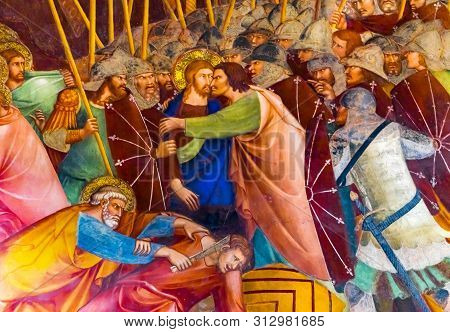 San Gimignano, Italy - September 26, 2017 Judas Christ Kiss Jesus Christ Medieval Renaissance Fresco