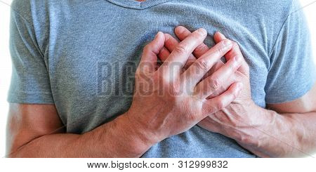 The Man Put His Hands Around The Chest, Pain In . Chest Spasm, Angina Pectoris. Heart Attack