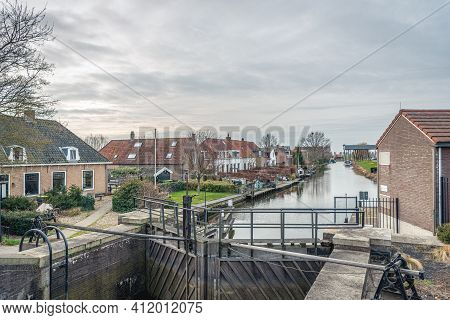 Gates Of The Lock In The Havenkanaal Near The Dutch Village Of Strijensas, Municipality Of Hoeksche 