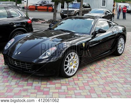 Kiev, Ukraine - May 14, 2011: Black Supercar Ferrari 599 Gtb Fiorano In The City