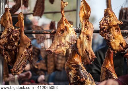 Head Of A Smoked Pig, A Young One, On Display In Serbia, In The Balkans, Used As Cured Meat. Porks A
