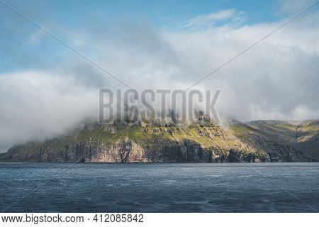 Picturesque Green Cliffs On Litla Dimun Island And Atlantic Ocean In Faroe Islands.