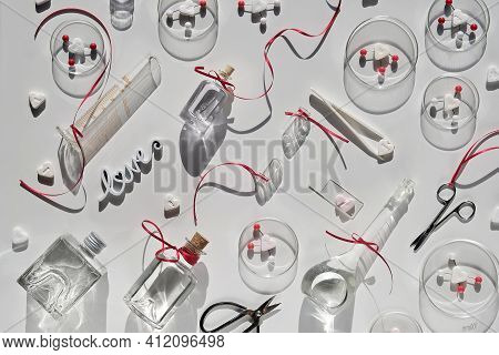 Chemistry Of Love. Creative Flat Lay, Top View With Chemical Glassware, Petri Dishes, Love Molecules