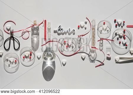Chemistry Of Love. Creative Flat Lay, Top View With Chemical Glassware, Petri Dishes, Love Molecules