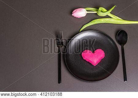 Festive Creative Black Table Setting With Tulips On Dark Background