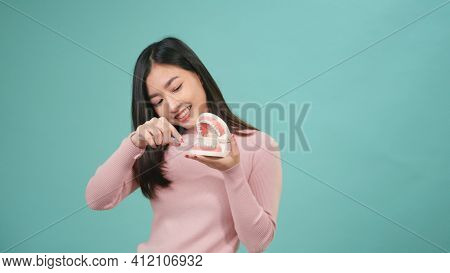 Asian Young Beautiful Woman Smile Showing Model How To Clean The Teeth With Toothbrush Properly And 