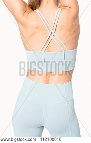 Woman in racerback sports bra sportswear apparel back view photoshoot