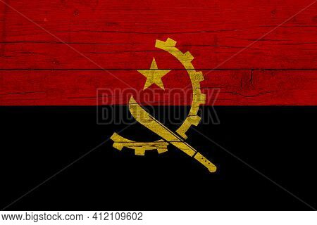 Flag Of Angola. Wooden Texture Of The Flag Of Angola.