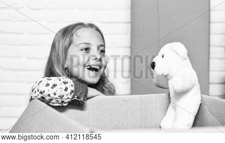 Little Child Open Post Package With Toys. Deliver Your Treasures. Storage For Toys. Delivering Happi