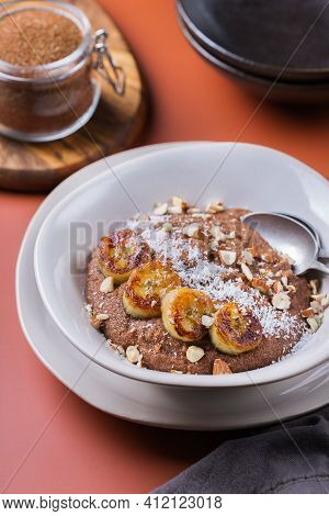 Teff Grain Porridge With Banana Topping For Breakfast