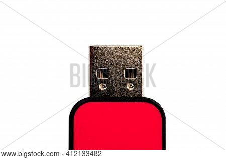 A Pink Usb Flash Drive With A Plastic Case, Shot Against A White Background.
