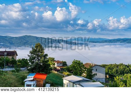 Foggy Morning View From The Hills Of San Capone To The Sibillini Mountains Park In Italy, Europe