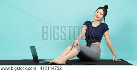 Fitness Influencer. Sporty Woman Blogger. Workout Training Online Via Laptop.