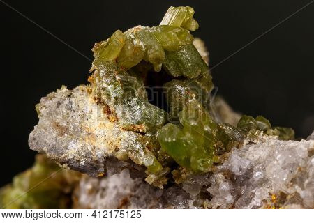 Macro Pyromorphite Mineral Stone On A Black Background Close Up