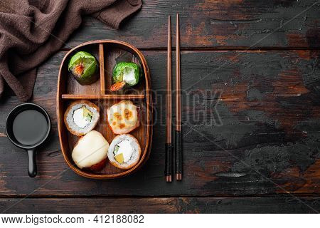 Japanese Meal In A Box Bento With Sushi Roll Eice Avocado Salmon Fish Set, On Old Dark  Wooden Table