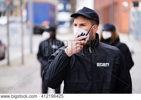 Security Officer Staff Or Bodyguard Protection In Face Mask