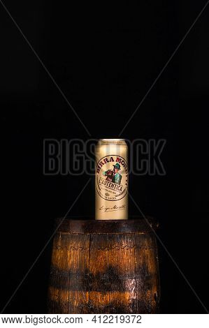 Can Of Birra Moretti Beer On Wooden Barrel With Dark Background. Illustrative Editorial Photo Buchar