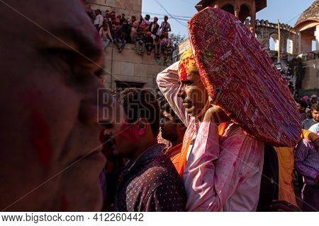 March 2021 Vrindavan,mathura.
People Celebrating Holi At Barsana On Holi Festival With Selective Foc