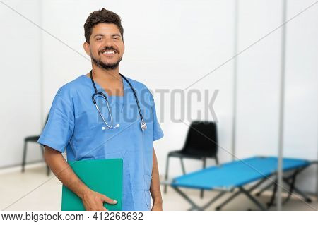 Handsome Latin American Doctor At Vaccination Station Is Ready For Vacinating Patients Against Coron
