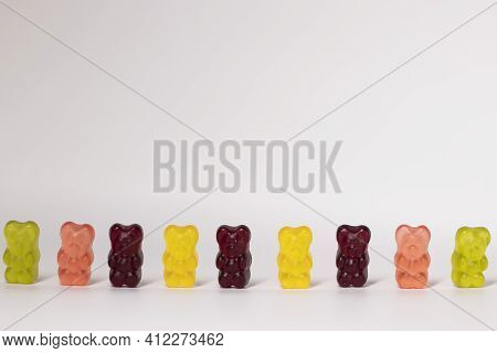 Colourful Sweet Gummy Bears Isolated On White Background.
